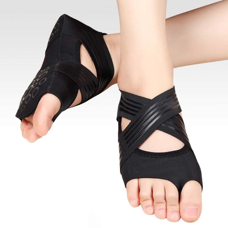 Black five-toe yoga shoes with cutout toe straps and grip sole
