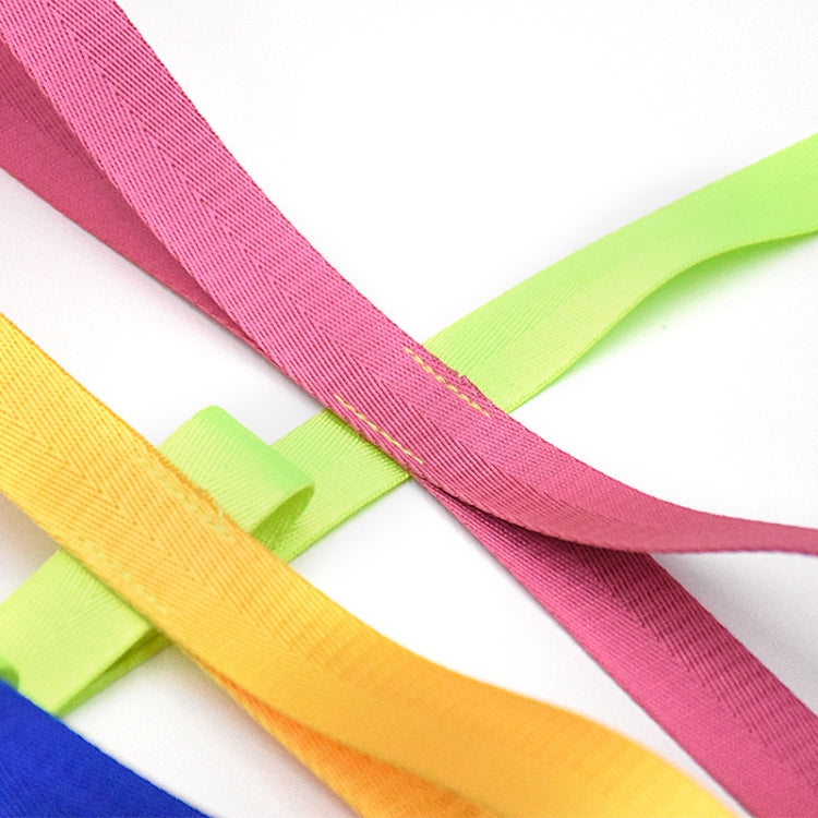 Close-up of woven children walking rope straps in pink, blue, yellow, and green