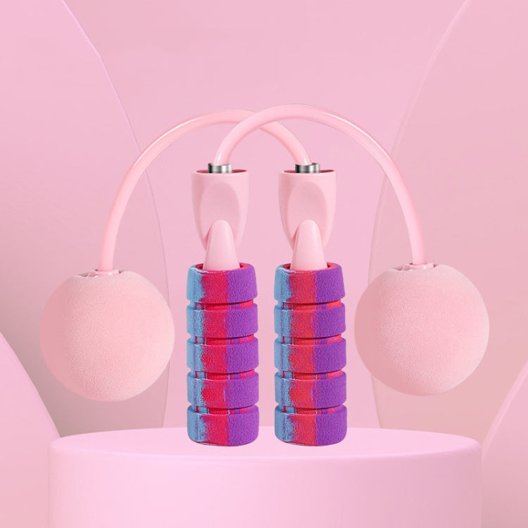 Cherry pink cordless skipping rope set with two handles, weighted end balls, and bead cord