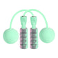 Mint green cordless skipping rope with two foam handles and weighted end balls