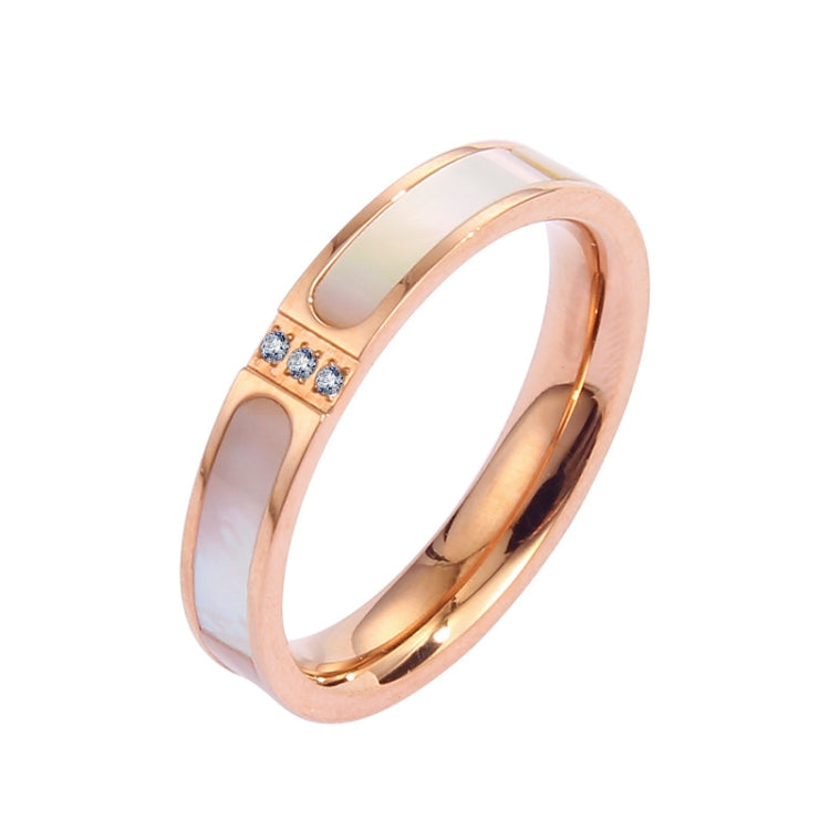 Rose gold couple ring with three small diamonds on top, smooth polished metal band