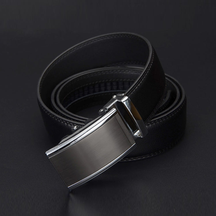 Black two-layer leather belt showing silver buckle and belt edge construction.