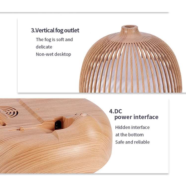 Birdcage wood humidifier showing DC power interface and vertical mist outlet