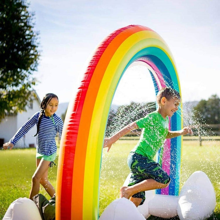 Inflatable rainbow arch sprinkler with multicolor tubes, white cloud bases, and water spray