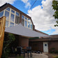 Waterproof anti-UV sunshade sail canopy stretched over patio
