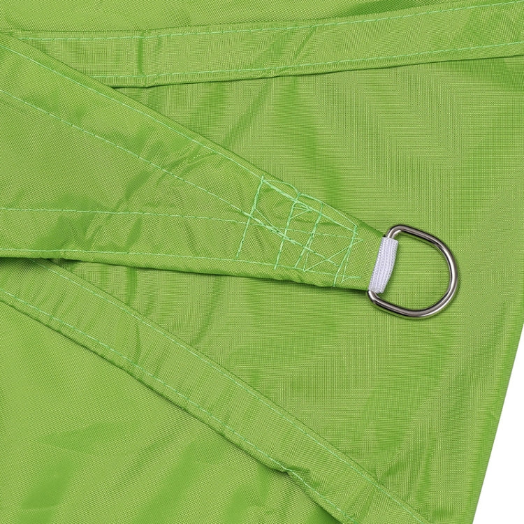Green waterproof sunshade sail corner with reinforced seam and metal grommet eyelet