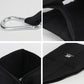 Black adjustable webbing strap with metal hook and stitched label