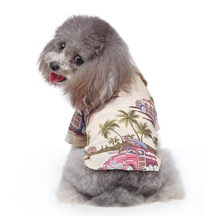 Dog summer shirt with beach and palm print on beige fabric.