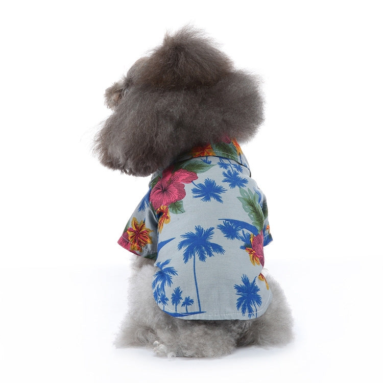 Dog beach shirt with tropical palm and flower print, blue background