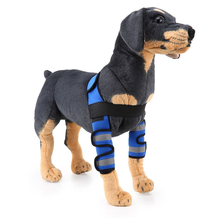 Dark gray plush dog knee guard with blue leg wraps and black fastening straps