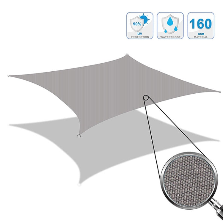 Gray outdoor canopy sail with corner eyelets and tension ropes