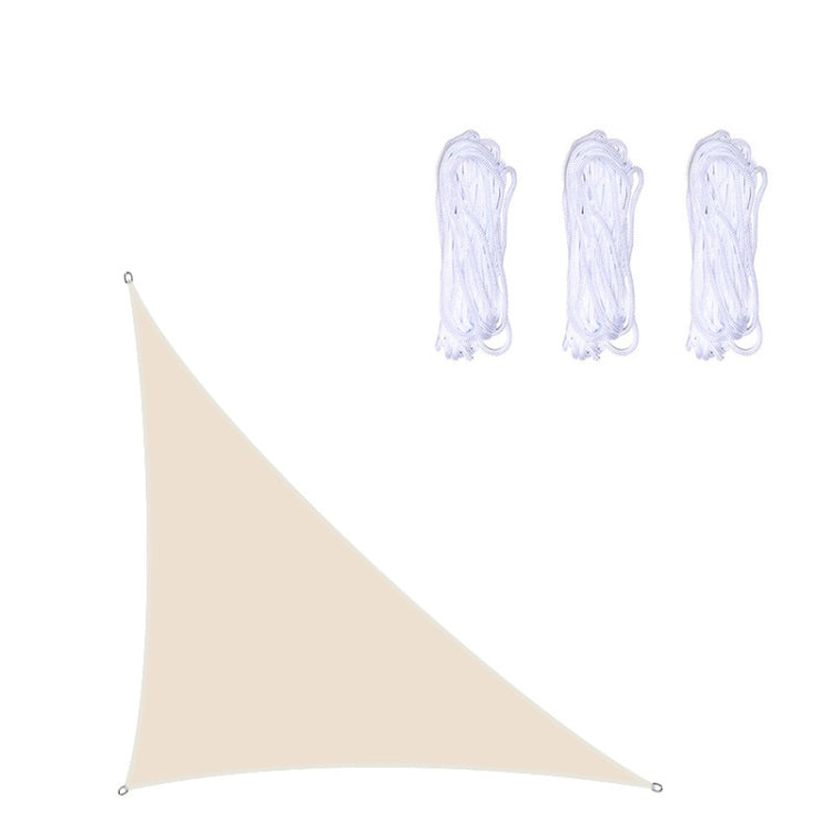 Beige triangular outdoor sunshade sail with corner grommets and rope ties