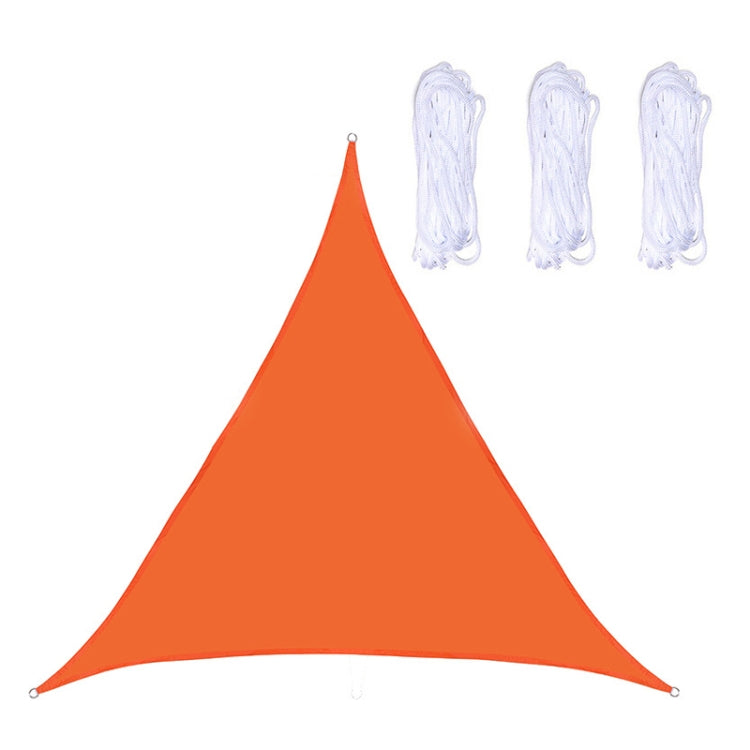 Orange triangular outdoor sunshade sail canopy with grommets and rope loops