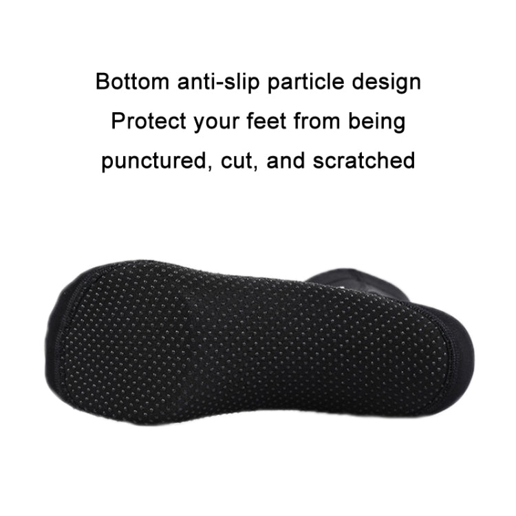 Black diving fin socks bottom with textured anti-slip particle pattern