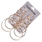 Gold-tone circle hoop earring set, 6 pairs, stacked on a jewelry card