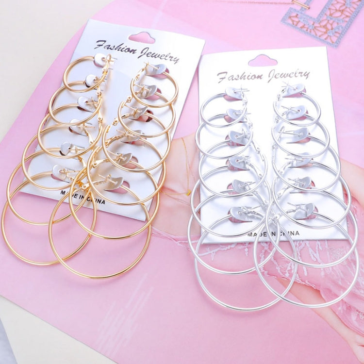 Gold- and silver-tone circle hoop earrings, 6 pairs total on two cards
