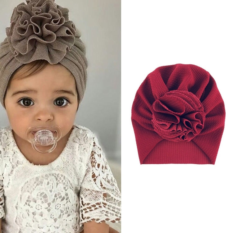 Baby turban hat in dark red with textured rosette flower, one size