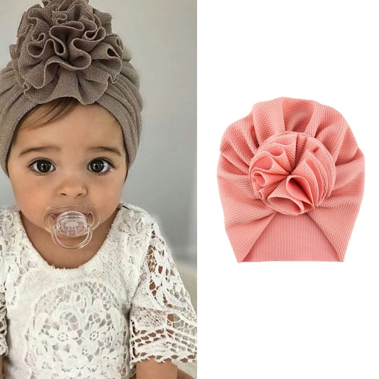 Baby turban hat in light pink with textured rosette flower, one size