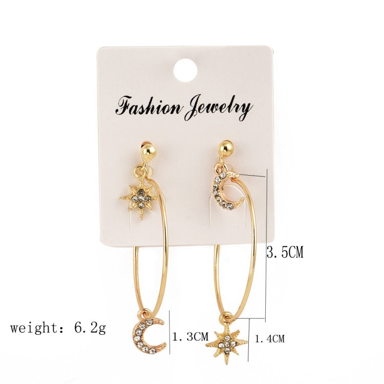 Fashion jewelry card with gold-tone hoop earrings featuring crescent moon and star charms