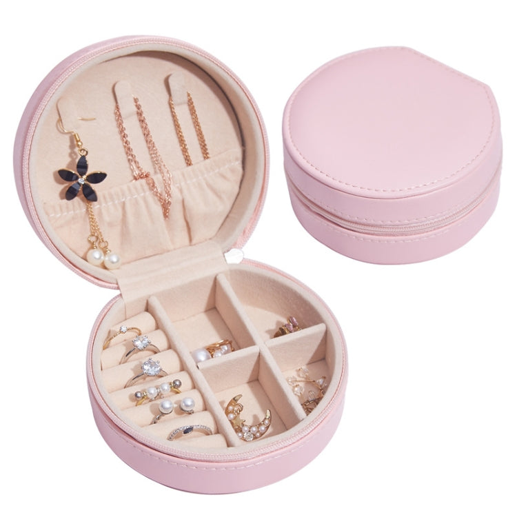 Round PU leather jewelry storage box, light pink exterior with pink-lined interior compartments