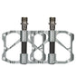 Silver carbon fiber bicycle platform pedals, dual studs and threaded axles.