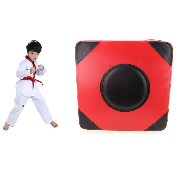 Red and black boxing wall target with a large oval striking pad on a square face