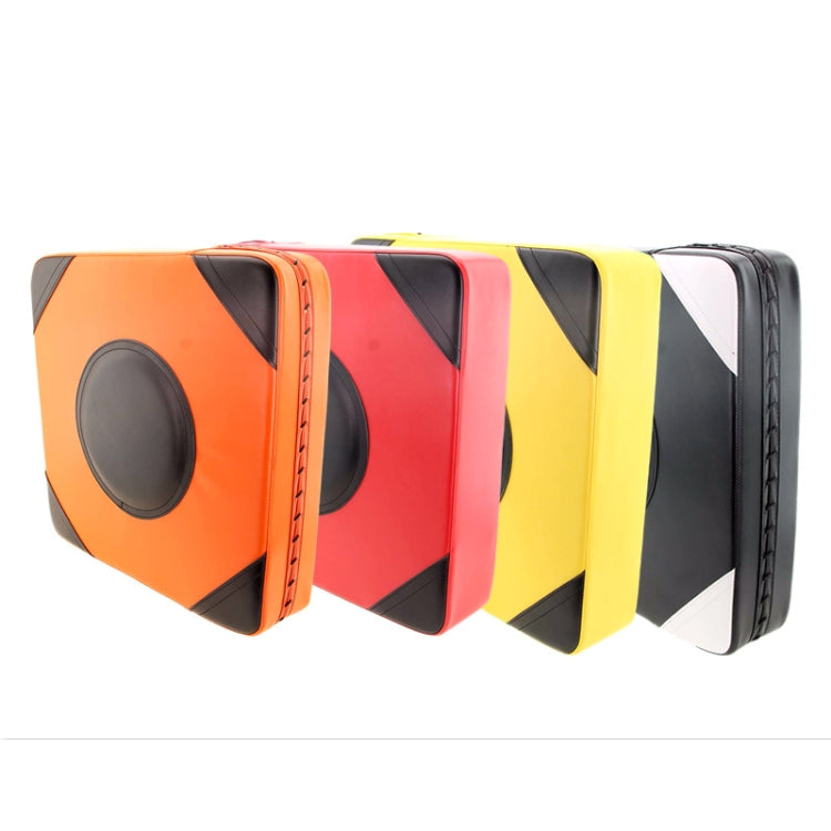 Stack of boxing wall targets in orange, red, yellow, and black colors with oval striking faces