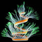 Fluorescent aquarium anemone decoration with green glowing tips and orange strip along center