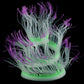 Fluorescent aquarium anemone decoration with purple tentacles and bright green base glow