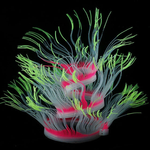 Fluorescent aquarium anemone decoration with green-tipped tentacles and pink-red highlights