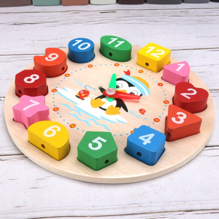 Round children’s number clock puzzle with penguin theme and colorful numbered blocks