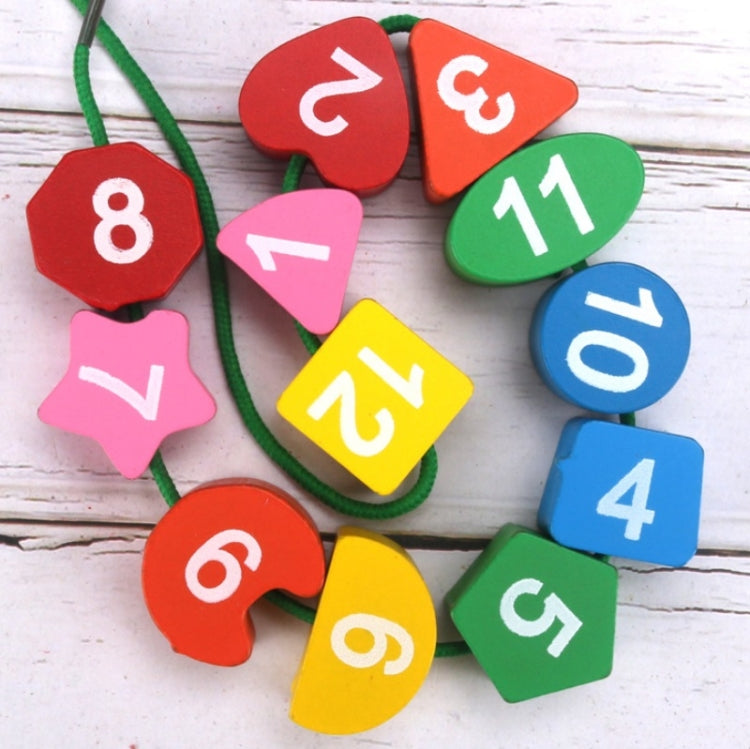 Number clock puzzle pieces with dangling green string and red, pink, blue numbers