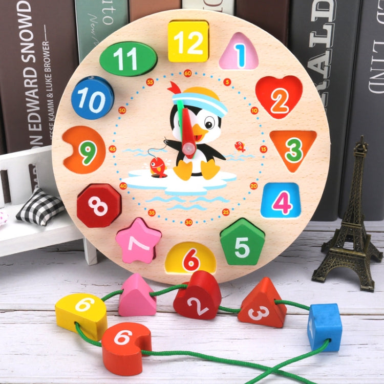 Children’s number clock block puzzle featuring penguin and numbered hex pieces 1–12