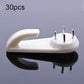 White press-free hanging hook with black grip pad and three metal pins