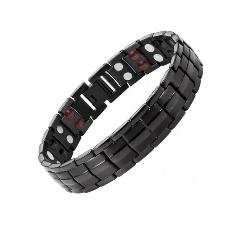 Black magnetic therapy bracelet with linked metal plates and red and white inset magnets