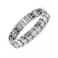 Silver-tone magnetic therapy bracelet with linked metal bands and red and white inset magnets