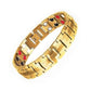 Gold-tone magnetic therapy bracelet with linked metal plates and red and white inset magnets