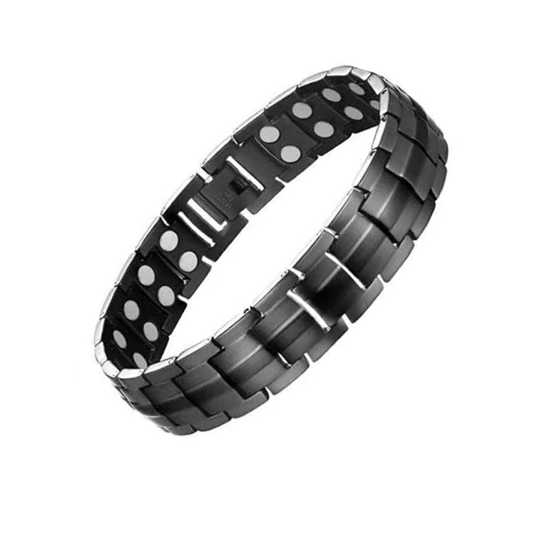 Black magnetic therapy bracelet with shiny metal links and red and white inset magnet plates