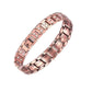 Rose-gold magnetic therapy bracelet with linked metal bands and red and white inset magnets