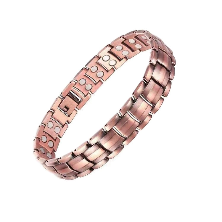Rose-gold magnetic therapy bracelet with linked metal bands and red and white inset magnets