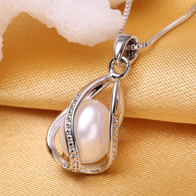 Silver-tone teardrop cage pendant with natural pearl and rhinestone trim