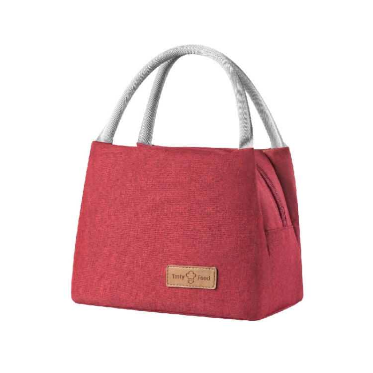 Wine red insulated lunch tote bag with top handles, front logo patch, and side zipper pocket