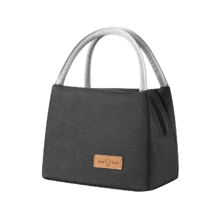 Black insulated lunch tote bag with top handles, front logo patch, and side zipper pocket