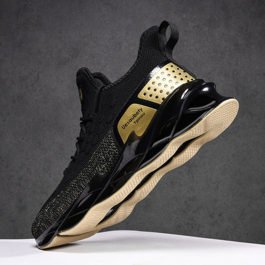 Men's black knit sports sneakers with gold perforated side panel and chunky sole