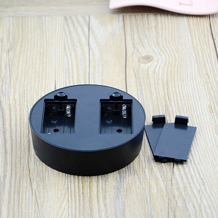 Battery compartment base for rotating magnetic globe ornament with two battery slots