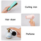Pretend hair tools and perfume set with teal curling iron, hair dryer, and perfume bottle