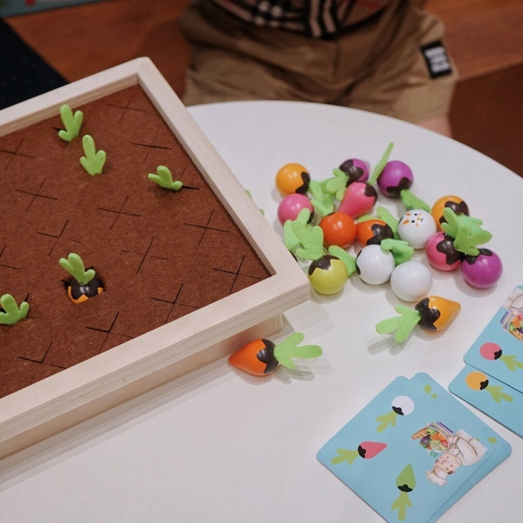 Wooden carrot memory chess board with scattered pawns and picture cards on table