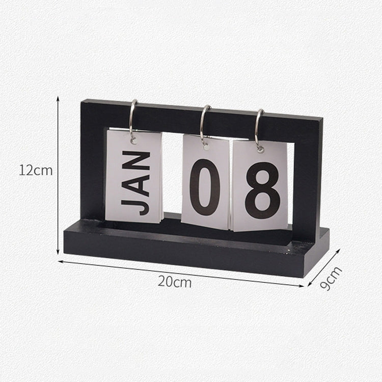 Black wooden flipping desk calendar with metal rings, cards showing JAN 08