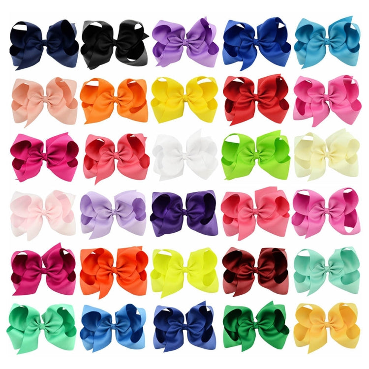 Colorful ribbon hair bow clips set with assorted solid bows in many colors.