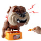 Cartoon poodle trick toy with open orange launcher and clicking hand action